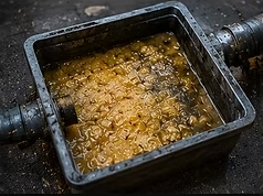 imagem de uma caixa de gordura cheia